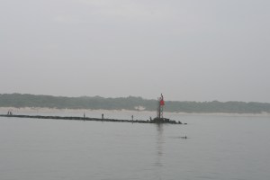 Arriving at Cape May in a sea fret. Note dophin